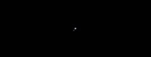 The Ralph imager on New Horizons took the first color image, seen here, of Pluto and Charon on April 9, 2015. Clearly visible are Pluto and Texas-sized Charon, the smaller dot. Credits: NASA/Johns Hopkins University Applied Physics Laboratory/Southwest Research Institute